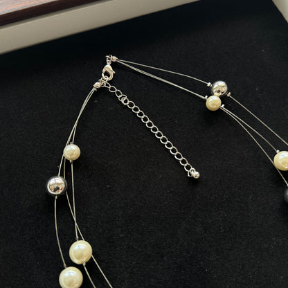 Three-Strand Pearl Necklace with Silver-Tone Beads